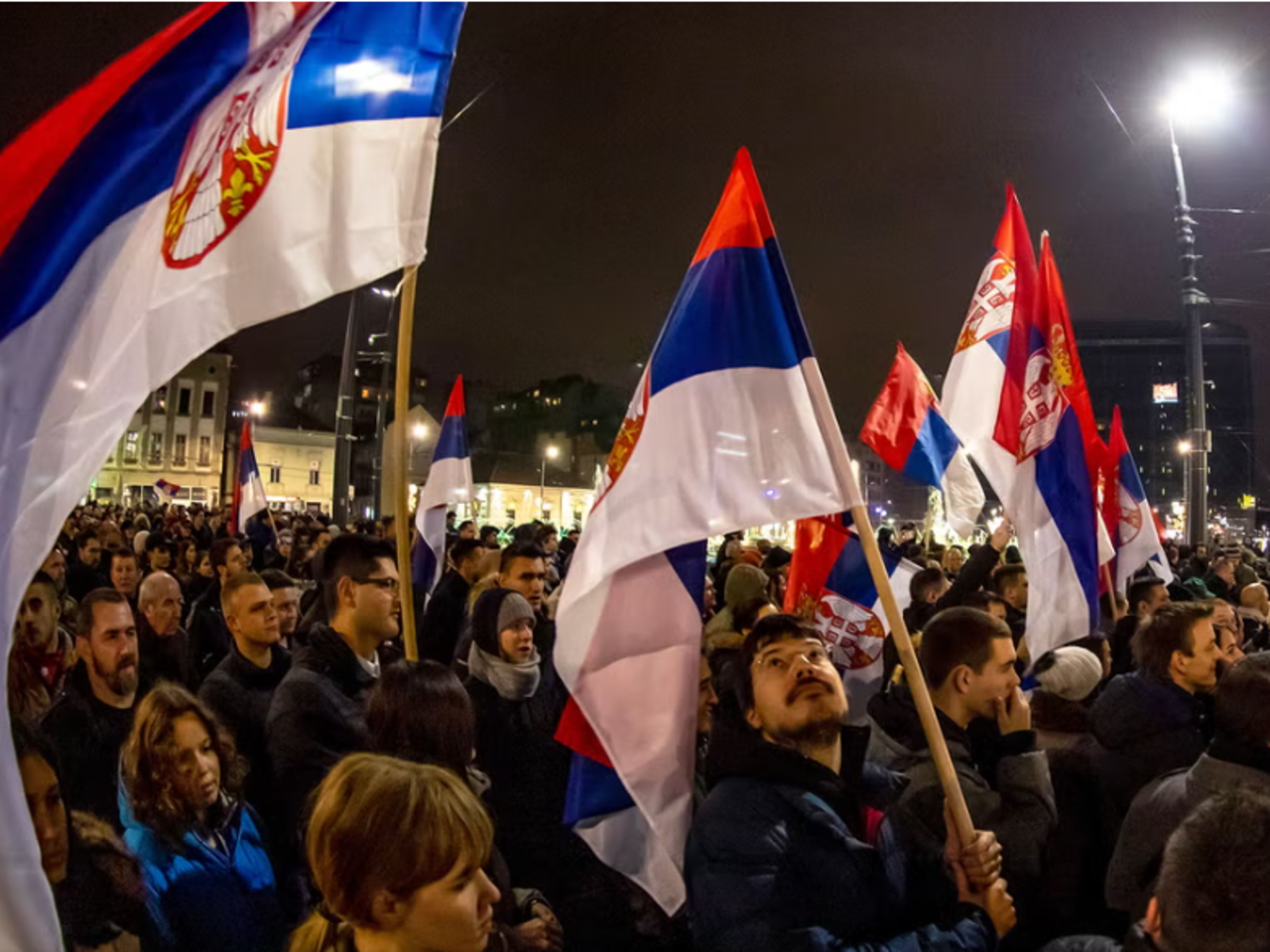 protestors with flags